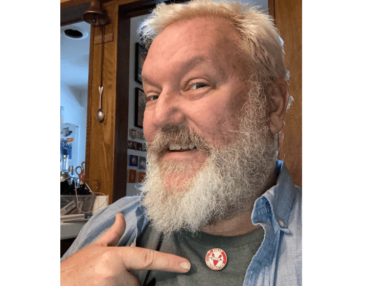 Mark W. Gray designed his ‘Fully Vaccinated’ pins in two days, he says