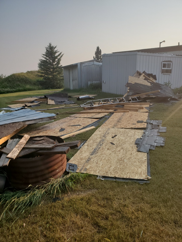 A couple living near Cromer, Man., are picking up the pieces after a volatile Saturday night storm peeled the roof off their home and caused other destruction.