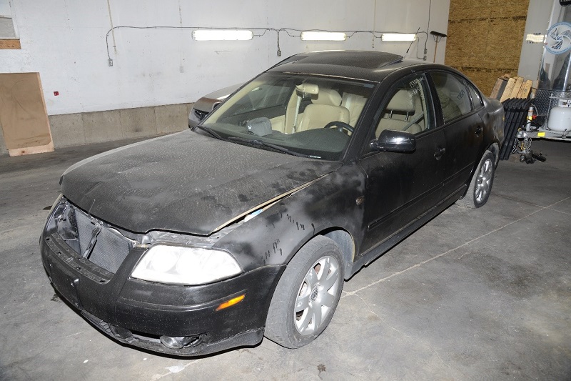 A photo of a 2002 Volkswagen Passat spray-painted black, one of two cars that RCMP say was associated with Rory McDonald’s disappearance.