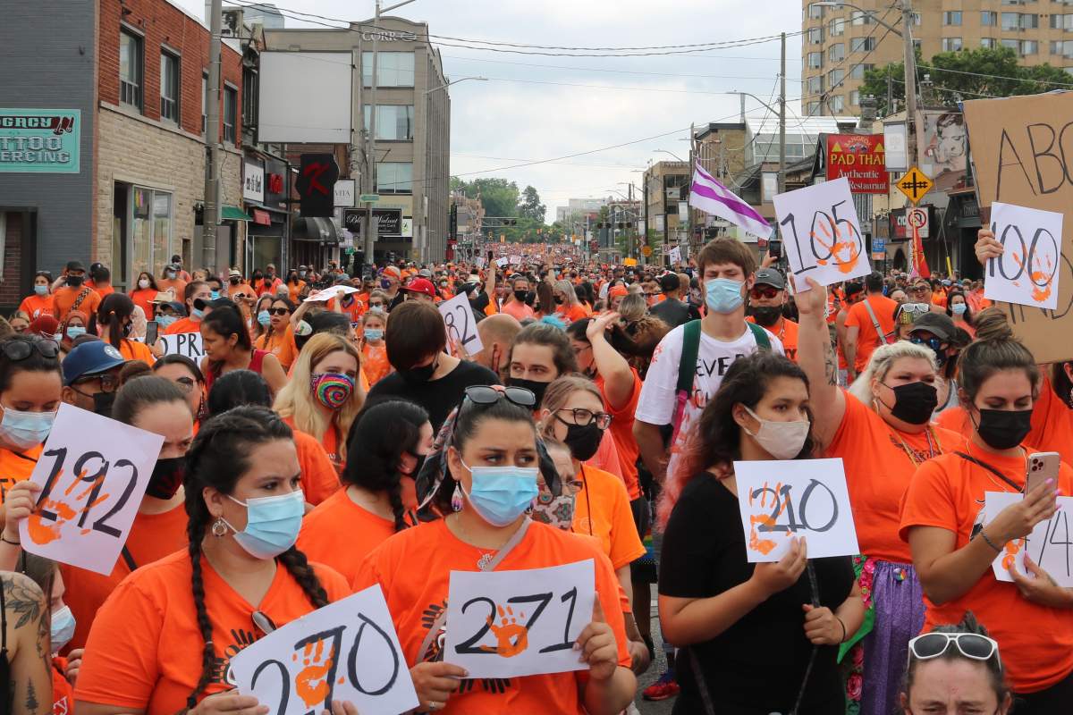 Over 10,000 peopled up Richmond Street from Central Avenue all the way to Oxford Street in London Ont. n July 1, 2021