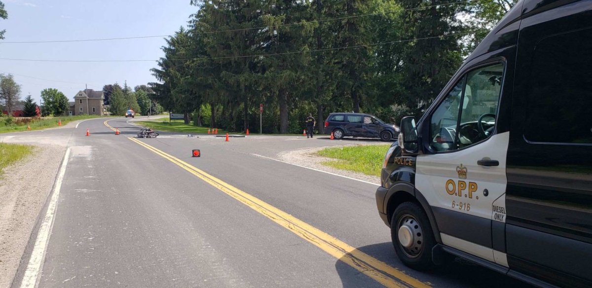 Elgin County OPP on scene of a two-vehicle collision involving a motorcycle on July 22, 2021.