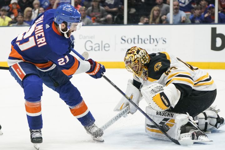 New York Islanders’ Kyle Palmieri (21) shoots the puck past Boston Bruins goaltender Tuukka Rask (40) during the second period of Game 6 during an NHL hockey second-round playoff series Wednesday, June 9, 2021, in Uniondale, N.Y.