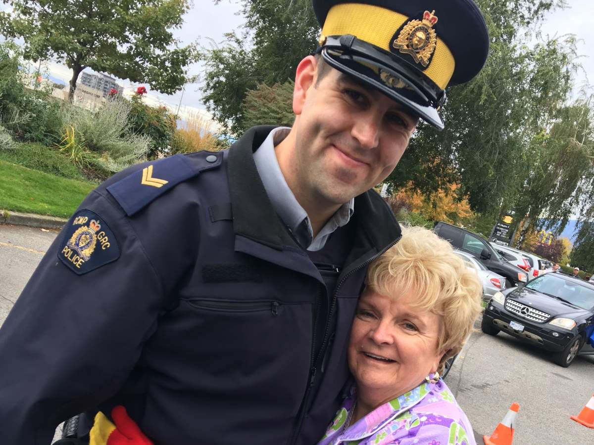 Cpl. Jesse O’Donaghey, seen here getting a hug from Kelowna city councilor Maxine DeHart during a charitable fundraiser.