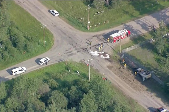 Serious collision between car and dump truck on road west of Edmonton