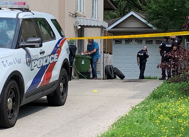 Officers were seen outside a home on Yorkdale Crescent Wednesday afternoon.