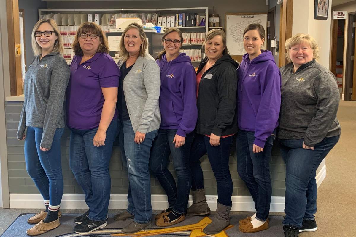 Seven women who work for the township of Zorra, Ontario pose for a photo