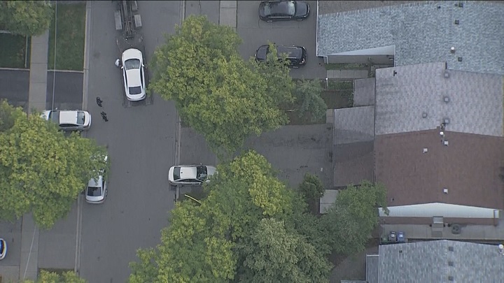 An aerial view of the scene where a child has died after being hit by a vehicle in the driveway of a Brampton home.