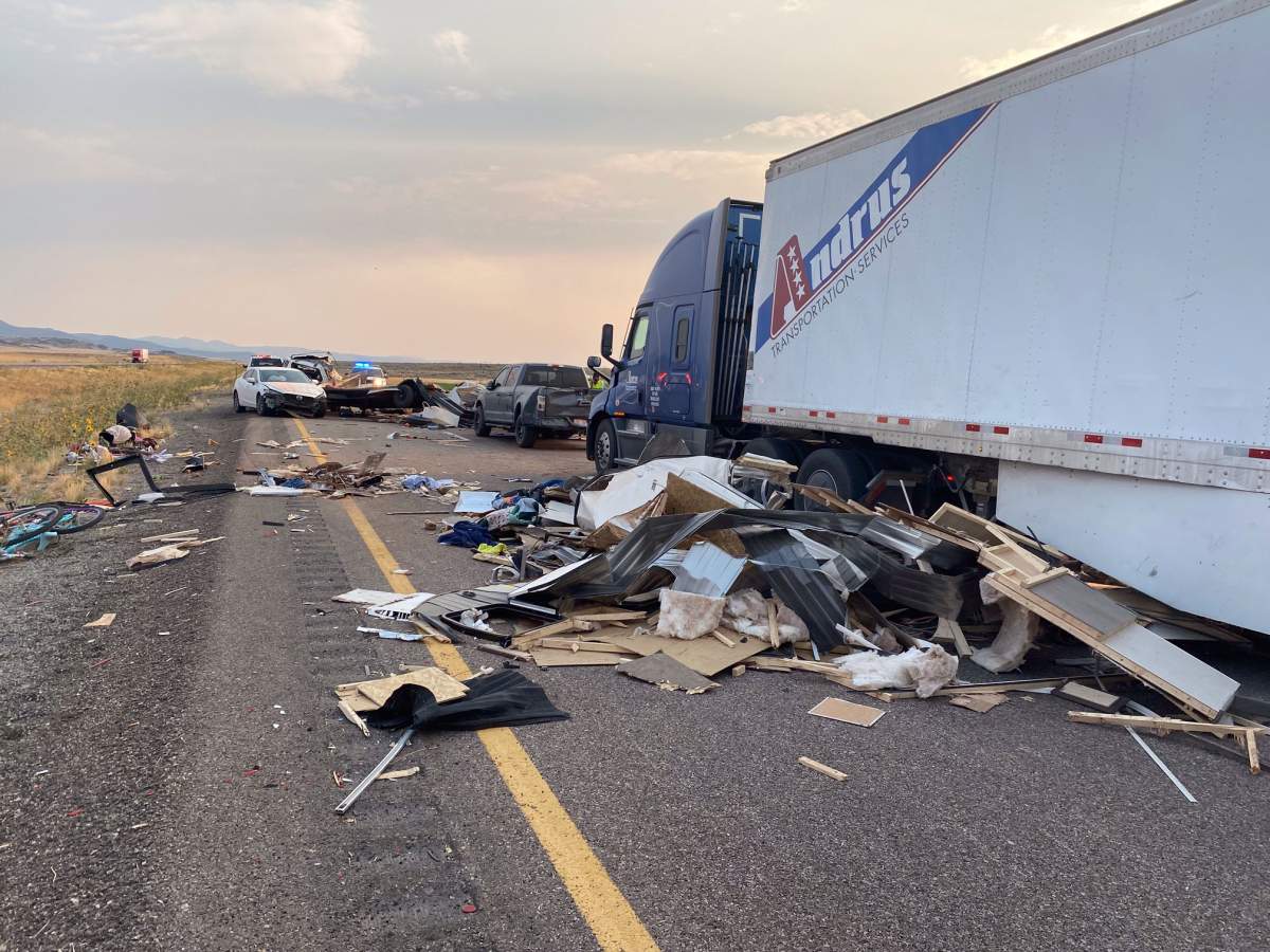 Wreckage is shown at the scene of a crash on Interstate 15 in Utah on July 25, 2021.