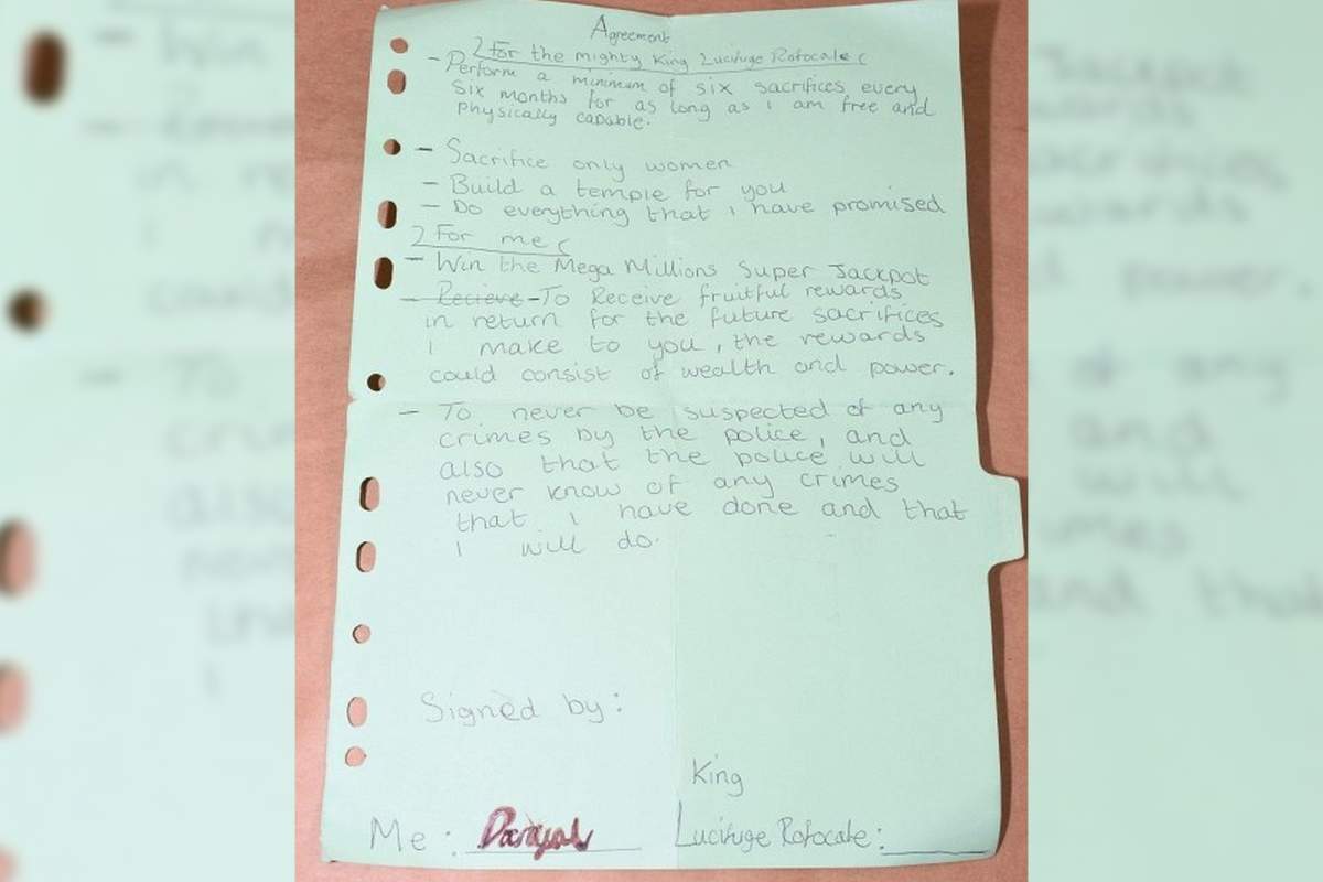 Danyal Hussein’s hand-written ‘deal with the devil’ is shown. He signed his first name in blood at the bottom, police say.