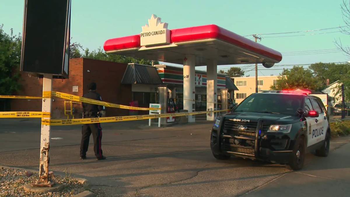 The Edmonton Police Service investigates a suspicious death outside a convenience store in the area of 107 Avenue and 115 Street Monday, July 12, 2021.
