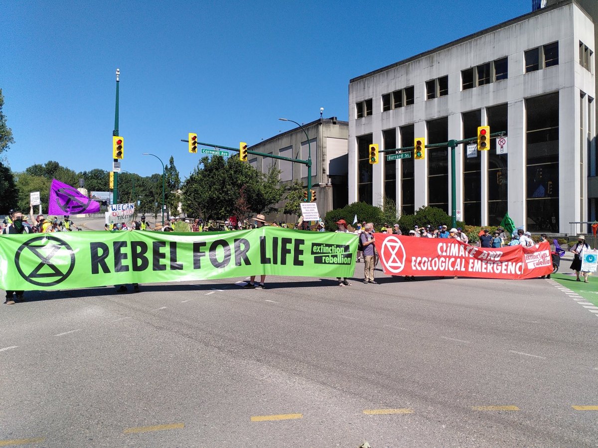 Demonstrators occupy the intersection of Burrard and Cornwall streets. 