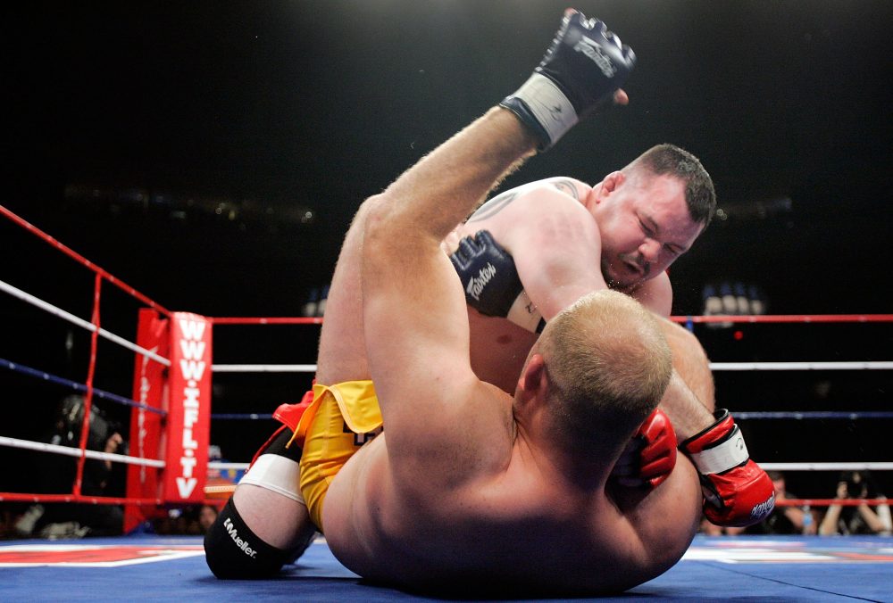 MMA fighter Travis Fulton, top, is shown during a fight on May 19, 2007 at the Sears Centre in Chicago.