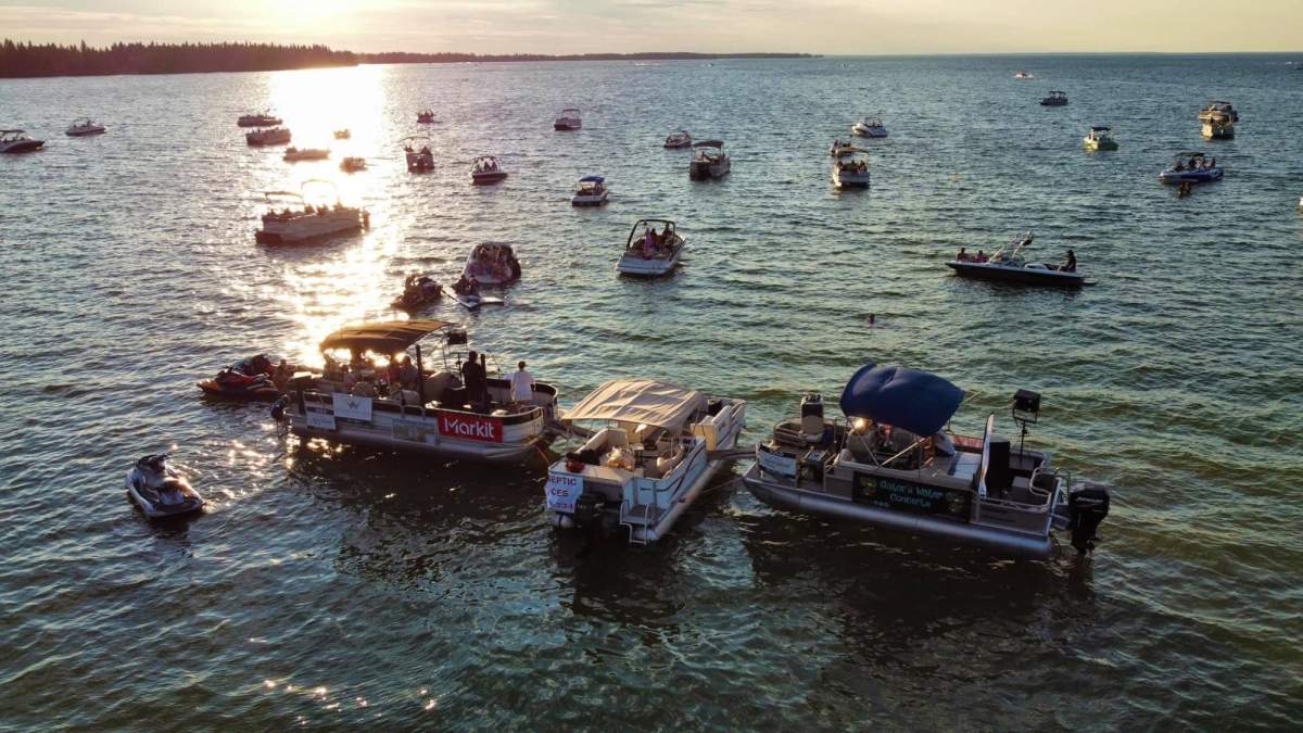 Boats gathered on Candle Lake to listen to a Gator’s Waterfest concert.