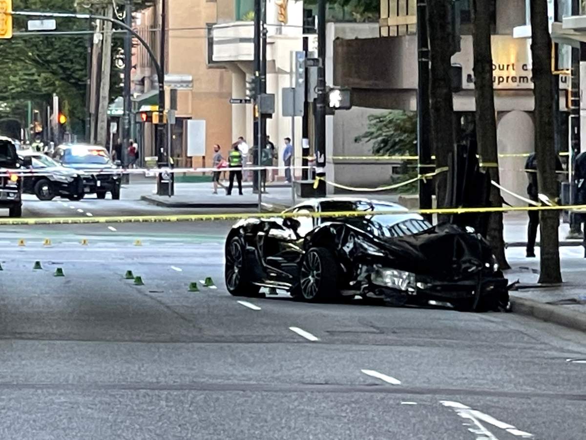 The scene of a two-vehicle collision that caused one vehicle to crash into a pedestrian and his 11-month-old baby on July 6, 2021. Police say the baby was killed in the collision and the father was sent to hospital with unknown injuries.