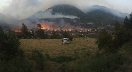 IN PHOTOS: Scenes of destruction after wildfire destroys village of ...