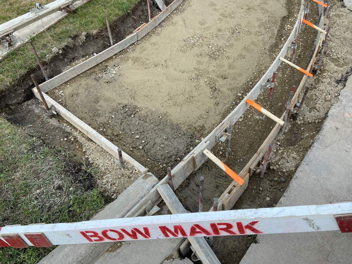 Work on sidewalk in Ramsay.