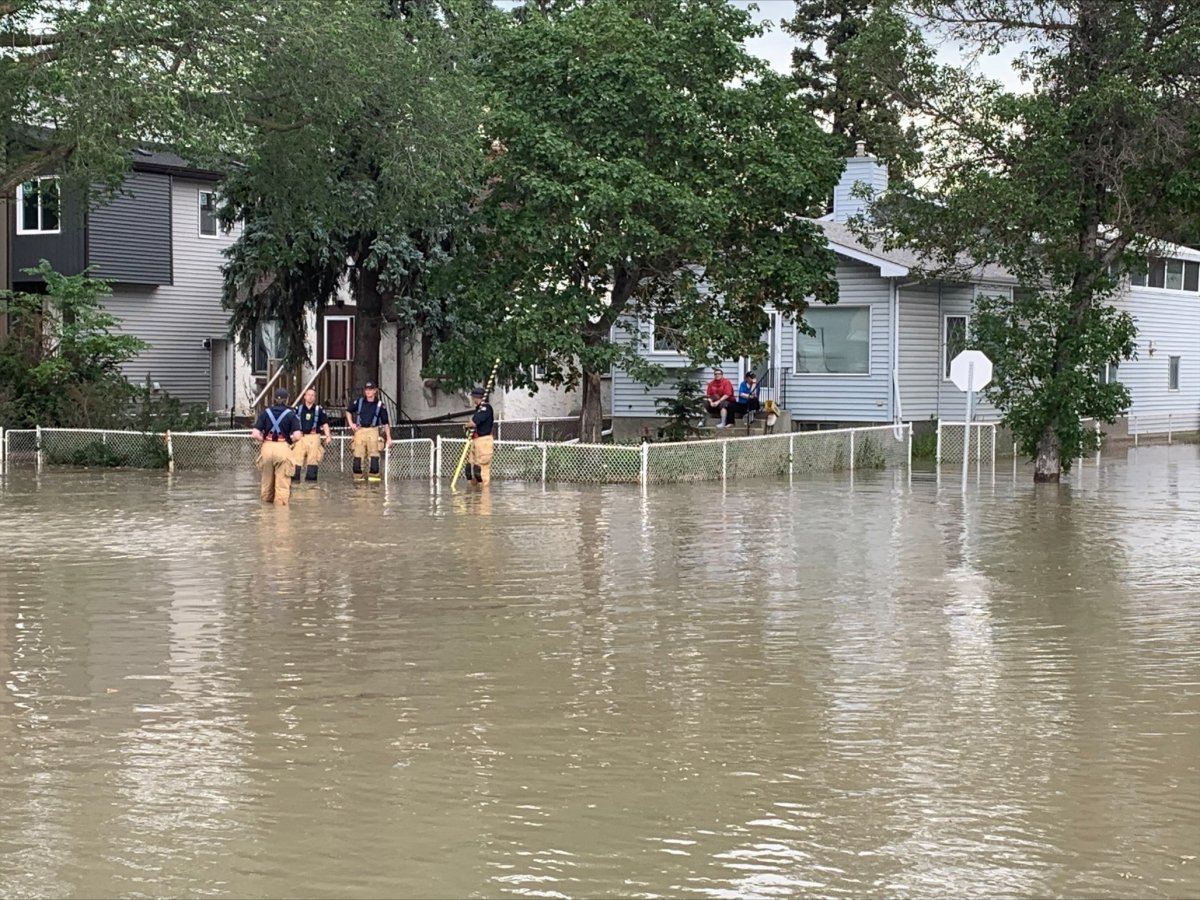 A water main break in north Edmonton causes flooding, Sunday, July 4, 2021. 