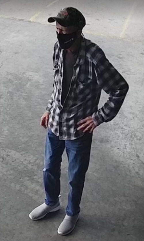 Security footage shows Paul Doughty at McKay’s Wild Blueberries on August 18.