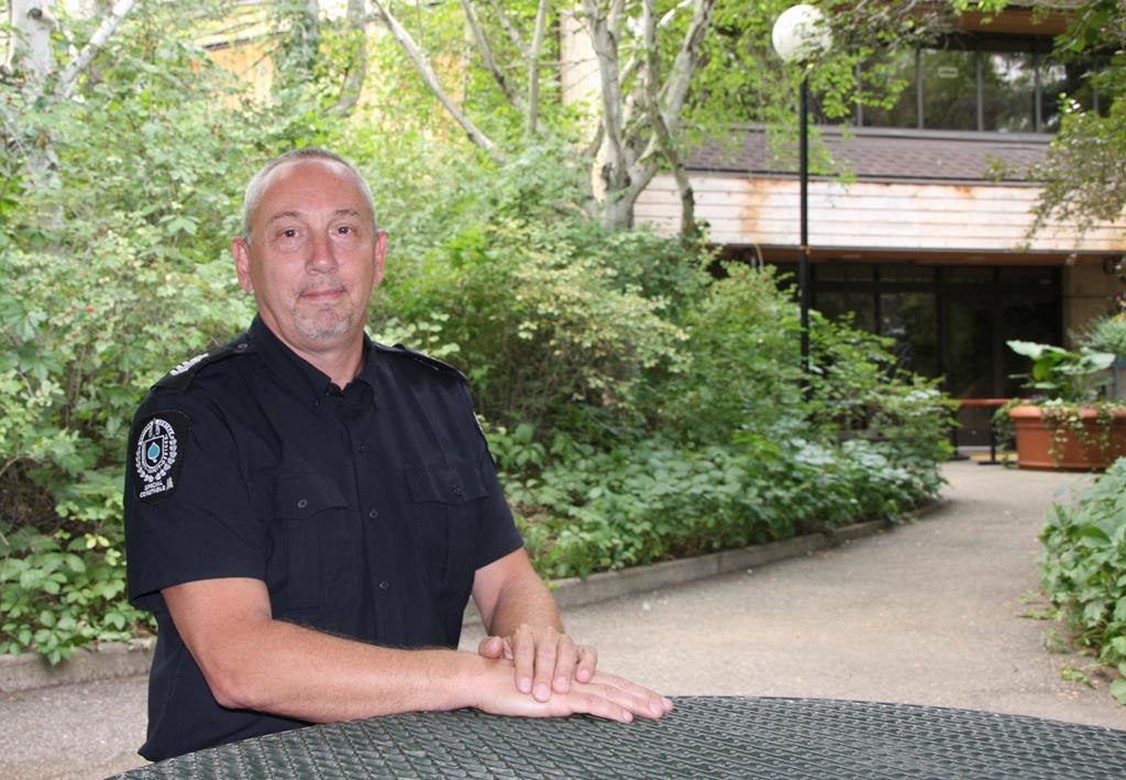 Sgt. Daryl Chernoff, who manages the community safety officer program at Wascana Centre, sits outside Wascana Place in Regina on Wednesday, July 28, 2021.
THE CANADIAN PRESS/Julia Peterson.
