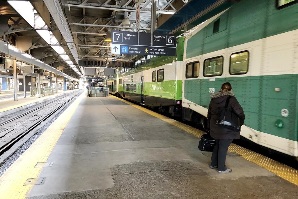 A lone traveller waits on a westbound GO Train platform at Union Station in Toronto on Monday, March 16, 2020. 