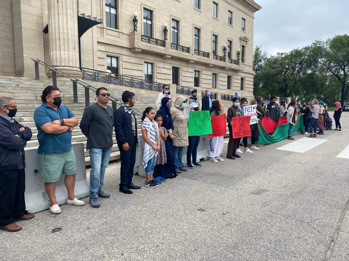 Several dozen people took to the steps of the Manitoba legislative building Saturday afternoon to raise awareness of the crisis unfolding in Afghanistan.