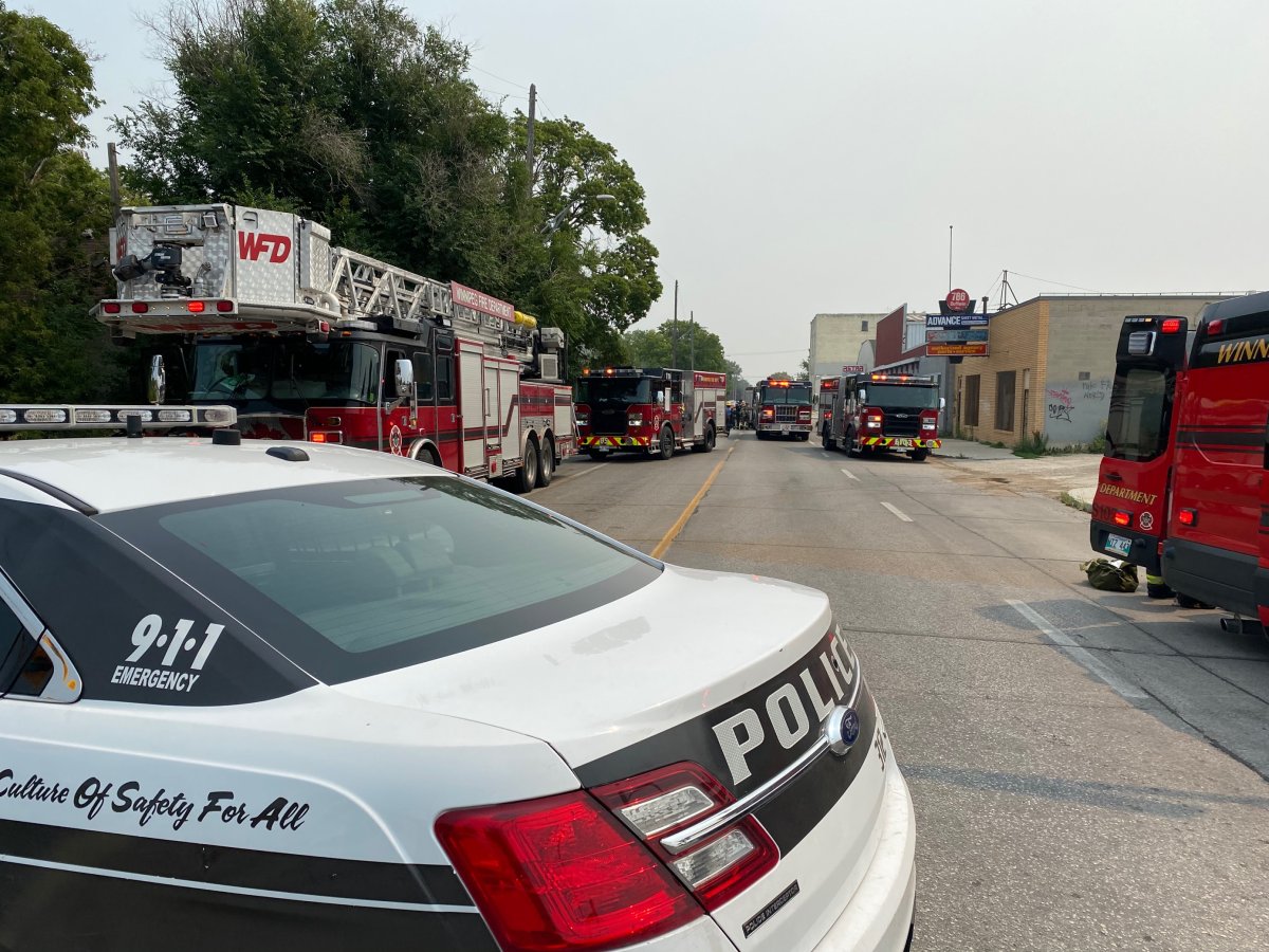 Winnipeg emergency services vehicles blocked traffic on Dufferin Avenue early Monday afternoon, while smoke could be seen coming from a nearby business.