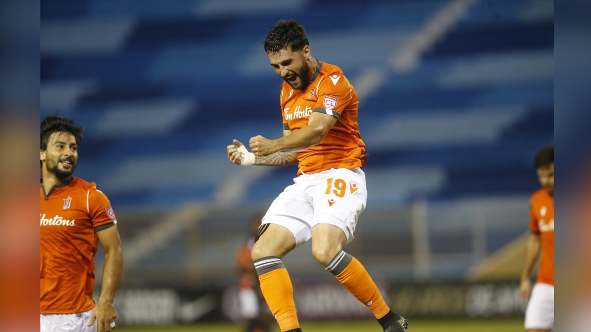 Midfielder Tristan Borges celebrates Forge FC's second goal during a Concacaf League match Thursday in San Salvador. The 3-1 win over CD FAS gives the CPL champs a two-goal lead going into the second leg of the series.