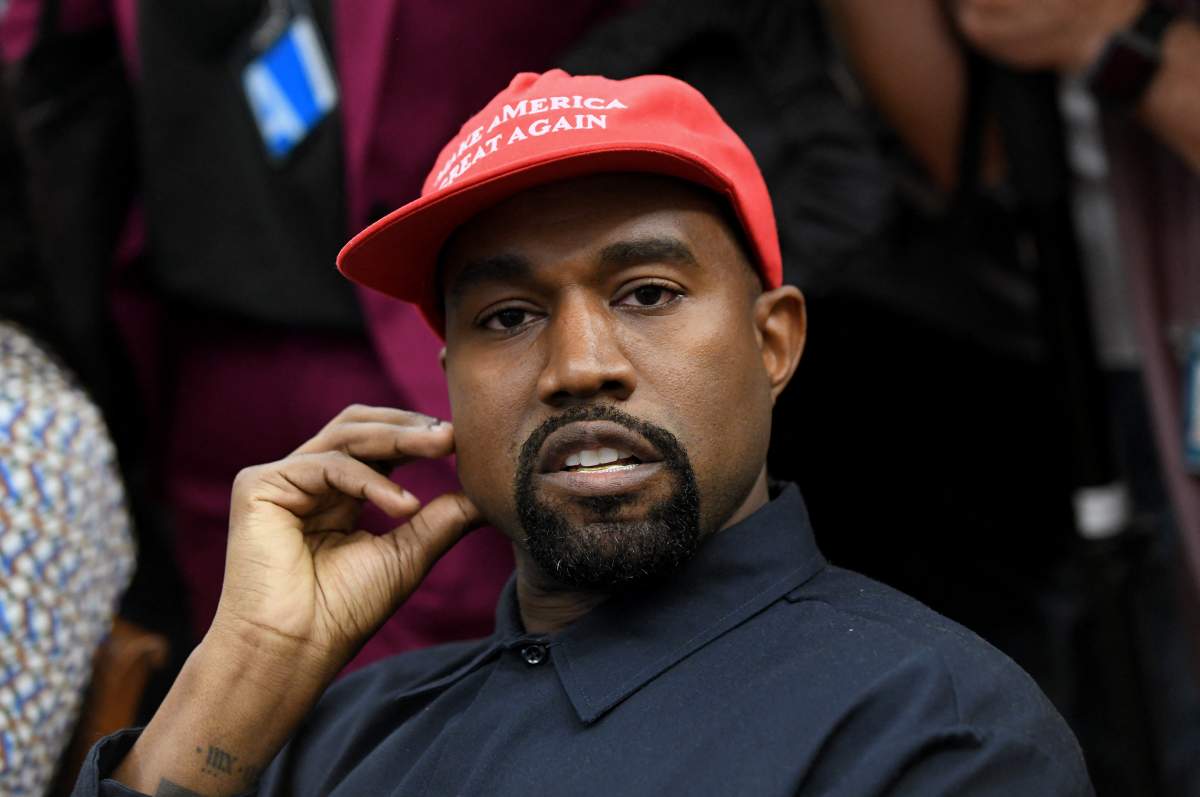 File photo of Artist Kanye West looks on in the Oval Office of the White House during a meeting with President Trump to discuss criminal justice system and prison reform on October 11, 2018 in Washington, DC.