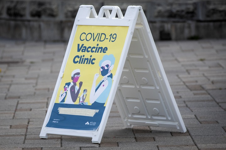 A poster at a COVID-19 walk-in vaccine clinic.