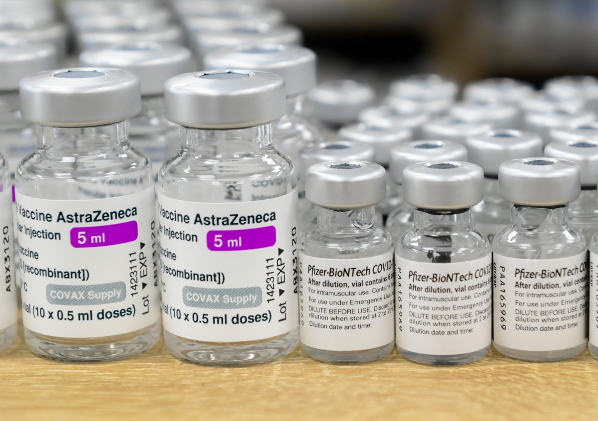 Vials of both Pfizer-BioNTech and Oxford-AstraZeneca COVID-19 vaccines sit empty on the counter at the Junction Chemist Pharmacy, in Toronto, Friday, June 18, 2021.