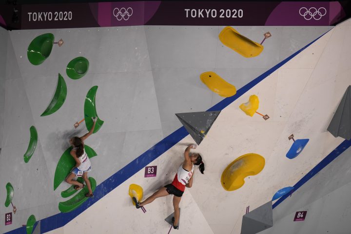 Laura Rogora, left, of Italy, and Alannah Yip, of Canada, climb during the bouldering qualification portion of the women’s sport climbing competition at the 2020 Summer Olympics, Wednesday, Aug. 4, 2021