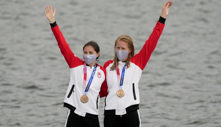 Laurence Vincent-Lapointe and Katie Vincent, of Canada, stand on the podium with their bronze medals after finishing third in the women's canoe double 500m final A at the 2020 Summer Olympics, Saturday, Aug. 7, 2021, in Tokyo, Japan. 