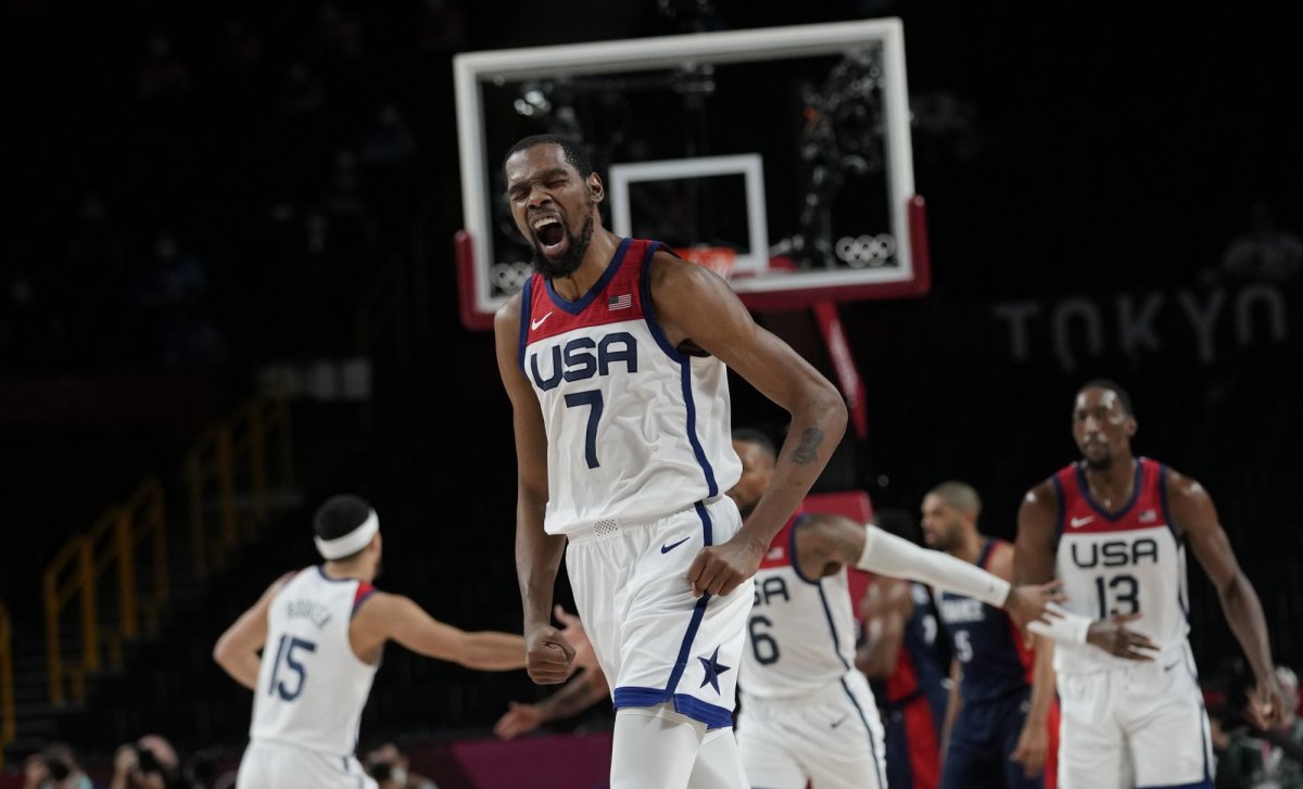 United States' Kevin Durant (7) celebrates after a score during men's basketball gold medal game against France at the 2020 Summer Olympics, Saturday, Aug. 7, 2021, in Saitama, Japan. (AP Photo/Eric Gay).