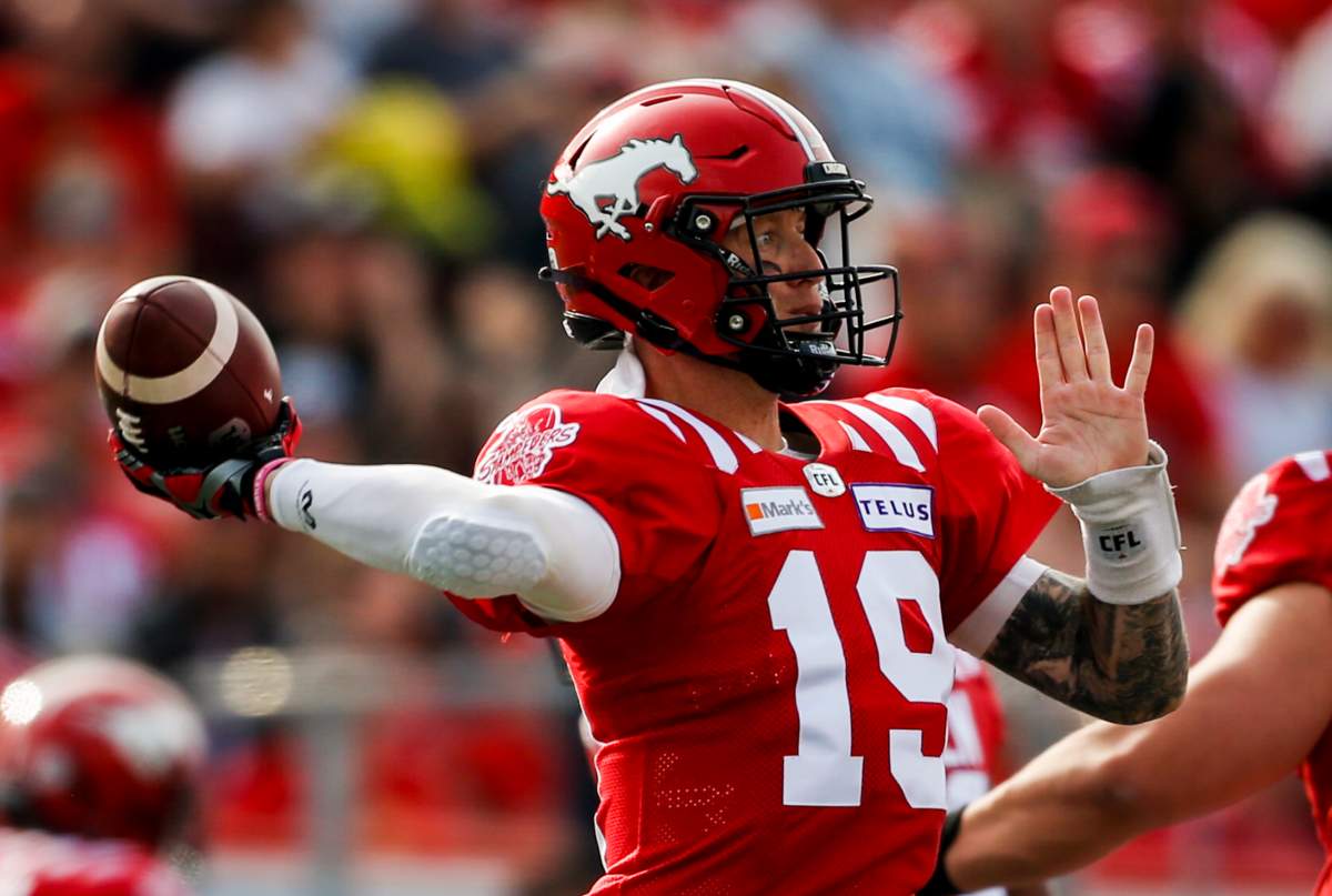 Calgary Stampeders quarterback Bo Levi Mitchell throws the ball against the Toronto Argonauts during CFL football action in Calgary, Saturday, Aug. 7, 2021.