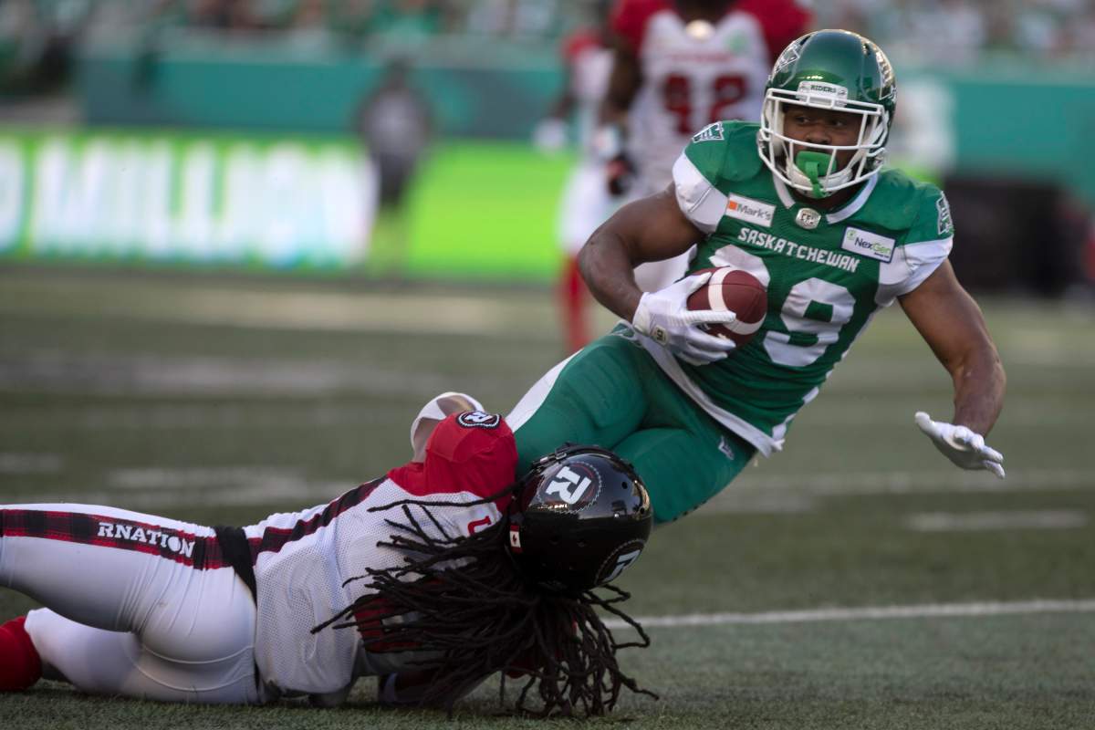Saskatchewan Roughriders running back William Powell (29) runs the ball against the Ottawa Redblacks during first half CFL football action in Regina on Saturday, August 21, 2021. 