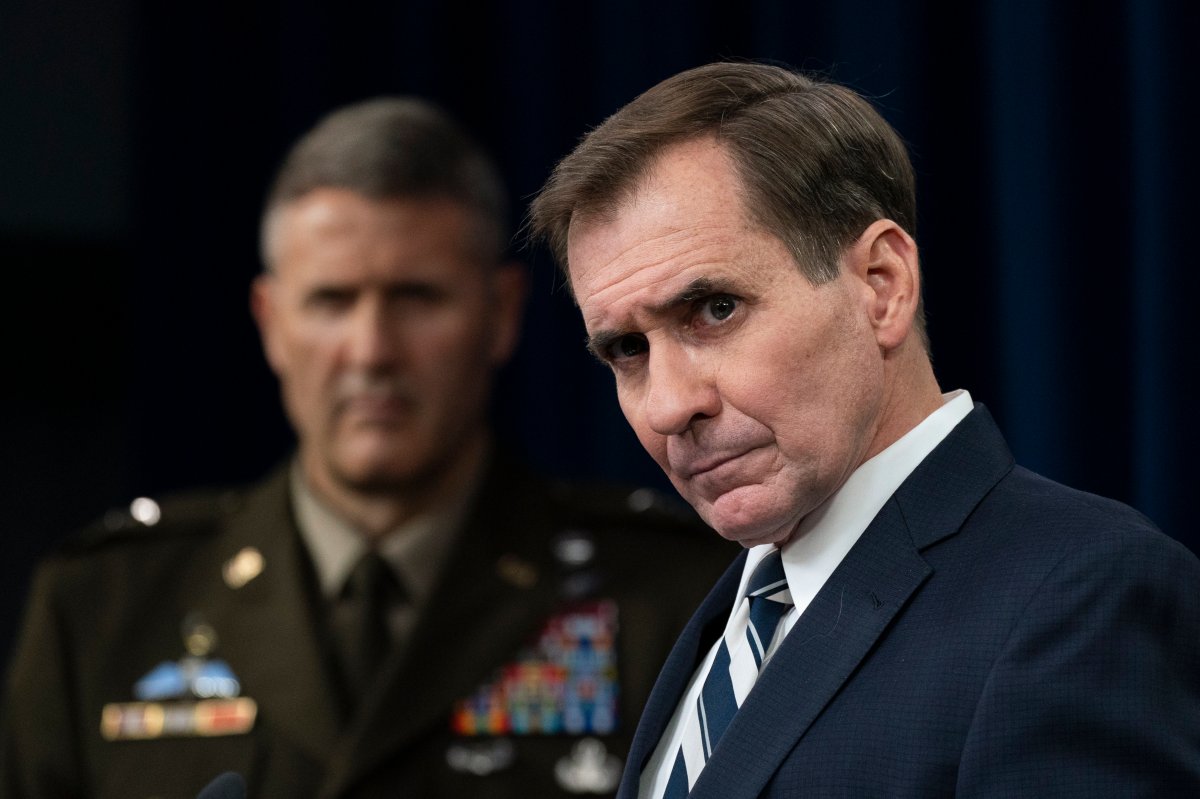 Pentagon spokesman John Kirby with U.S. Army Maj. Gen. William Taylor, Joint Staff Operations, listens to a reporter's question about Afghanistan during a briefing at the Pentagon in Washington, Monday, Aug. 23, 2021.