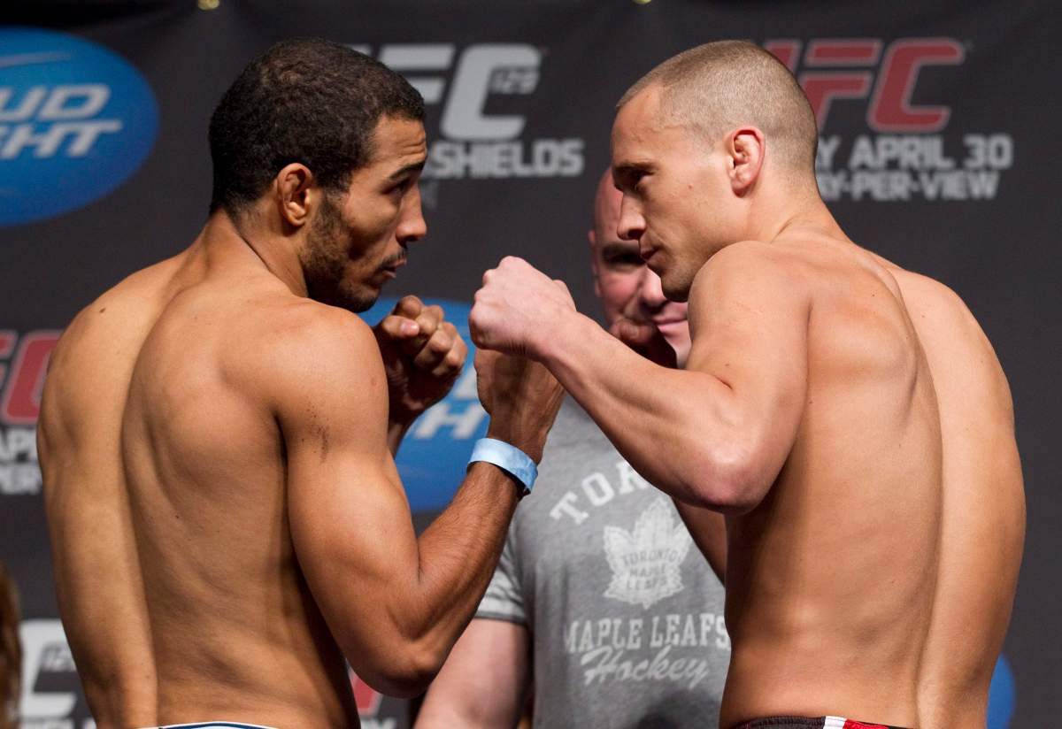 Mark Hominick from Thamesford, Ont. (right) poses with UFC featherweight champion Jose Aldo ahead of UFC bout 129 in Toronto on Friday 29, 2011. THE CANADIAN PRESS/Chris Young