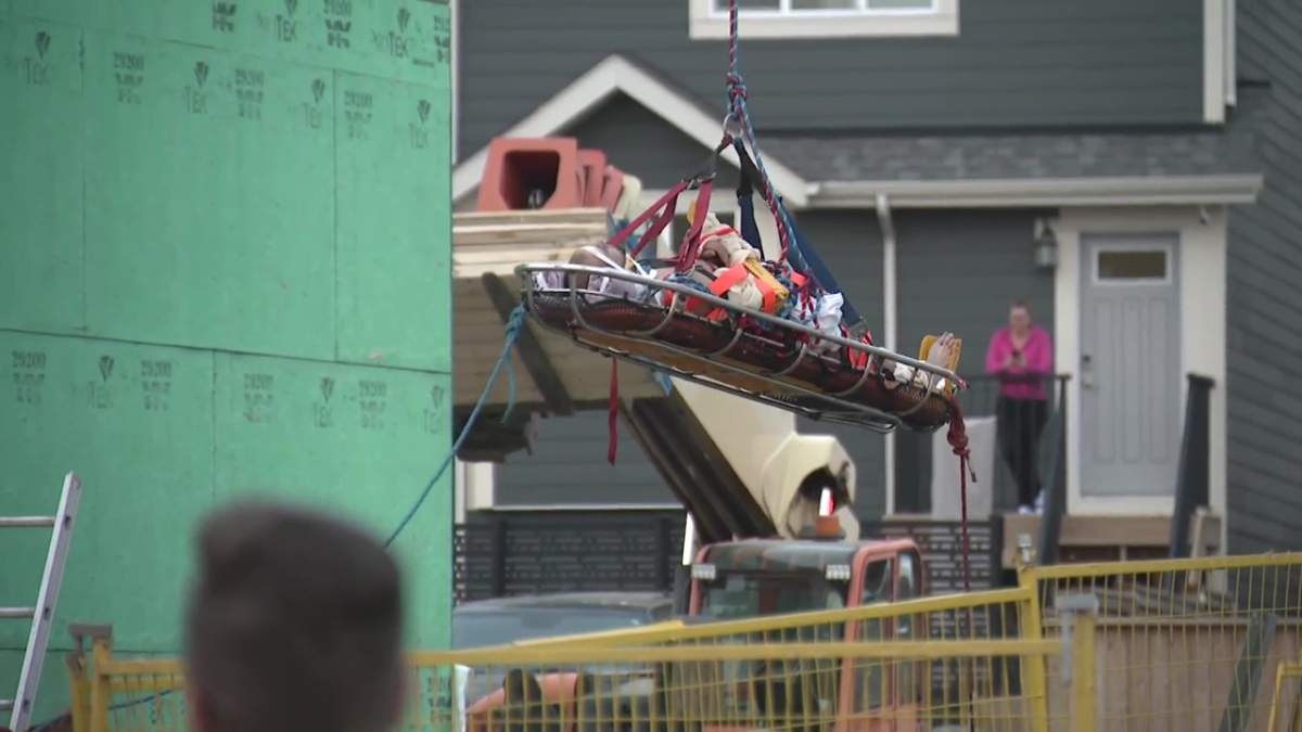 A Calgary construction worker fell from the roof he was working on into the open basement of the under-construction home next door at 500 block of Masters Road SE. in the Mahogany neighbourhood on Thursday, August 26, 2021.