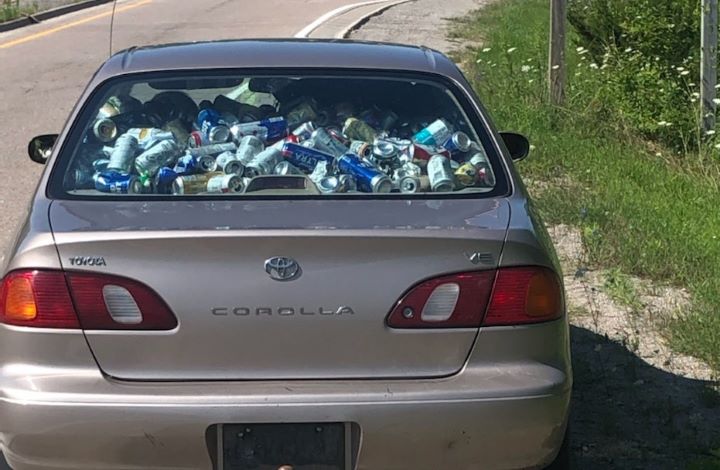 The driver was charged with having an insecure load and with driving while under suspension, according to police.