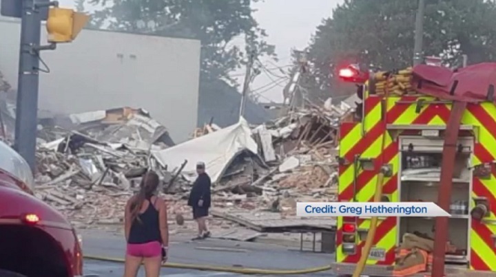 A heavily damaged building can be seen in Wheatley, Ont.