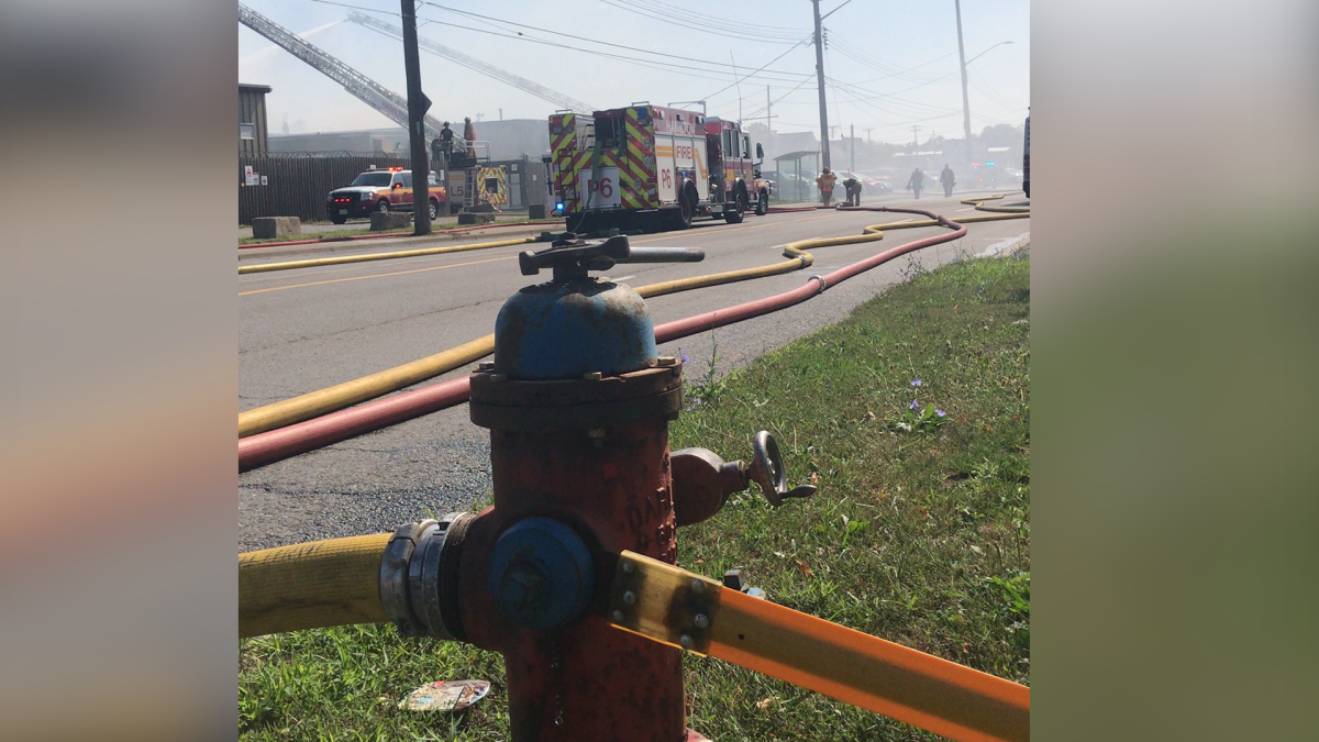 Firefighter battled a blaze at a commercial building in Hamilton on Barton Street East Saturday Aug. 14, 2020.
