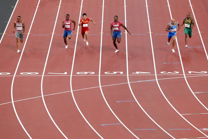 Lamont Marcell Jacobs of Team Italy crosses the finish line ahead of Fred Kerley of Team United States in the Men’s 100m Final