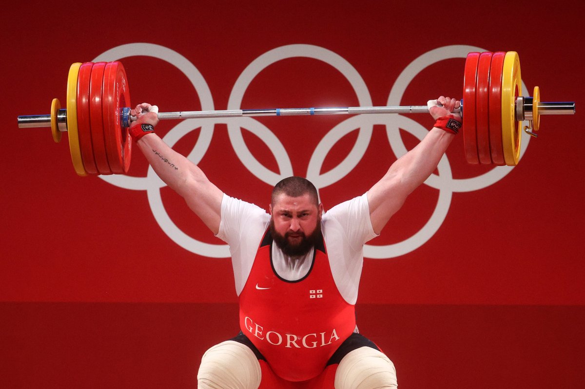 Lasha Talakhadze of Team Georgia competes during the Weightlifting - Men's 109kg+ Group A on day twelve of the Tokyo 2020 Olympic Games at Tokyo International Forum on August 04, 2021 in Tokyo, Japan. 
