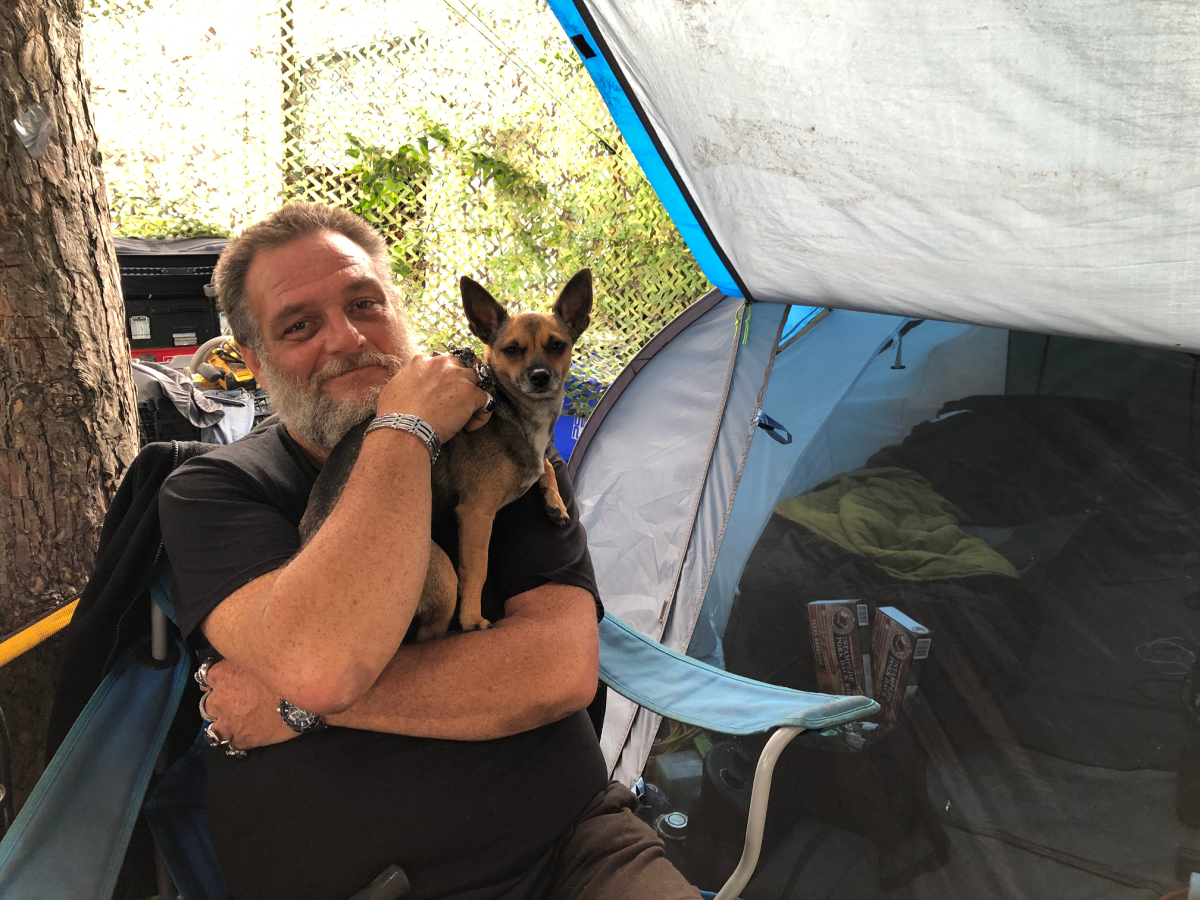 Gord Smyth, 54, has been living in a tent in Central Park on Bay Street with his dog Daisy for several weeks now and said he cannot afford market rent in Hamilton with what he receives from ODSP.