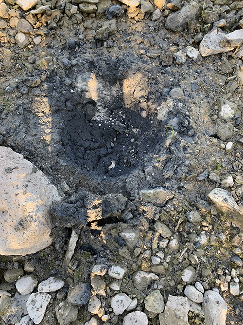 A crater left after the RCMP’s EDU countercharged the device and destroyed it.