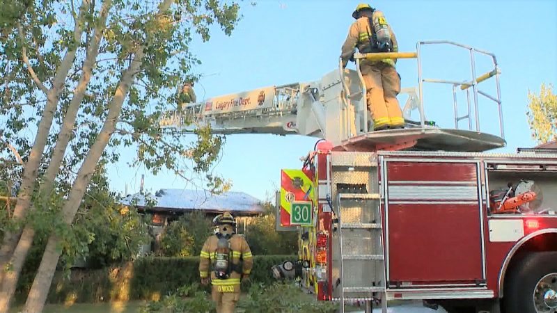 The Calgary Fire Department responds to a house fire in the 10000 block of 86 Street Southeast on Thursday, Aug. 12, 2021. 