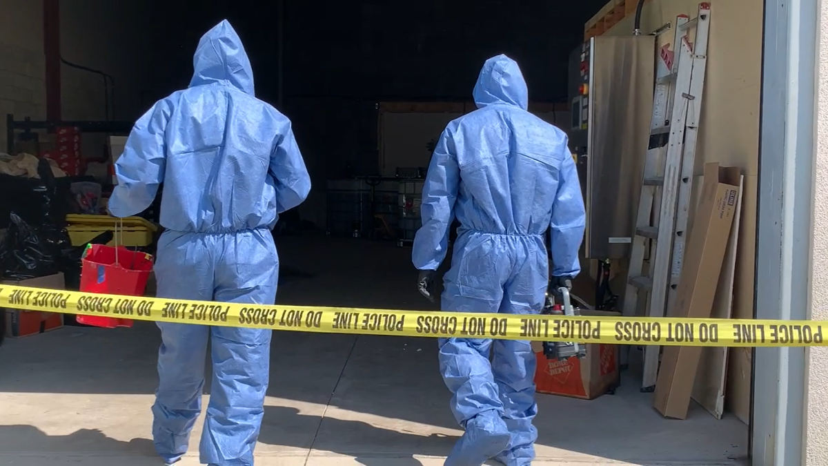 Hamilton police, firefighters, paramedics and provincial enforcement teams dismantle a cannabis oil extraction lab in the city's industrial sector on Aug. 21, 2021.