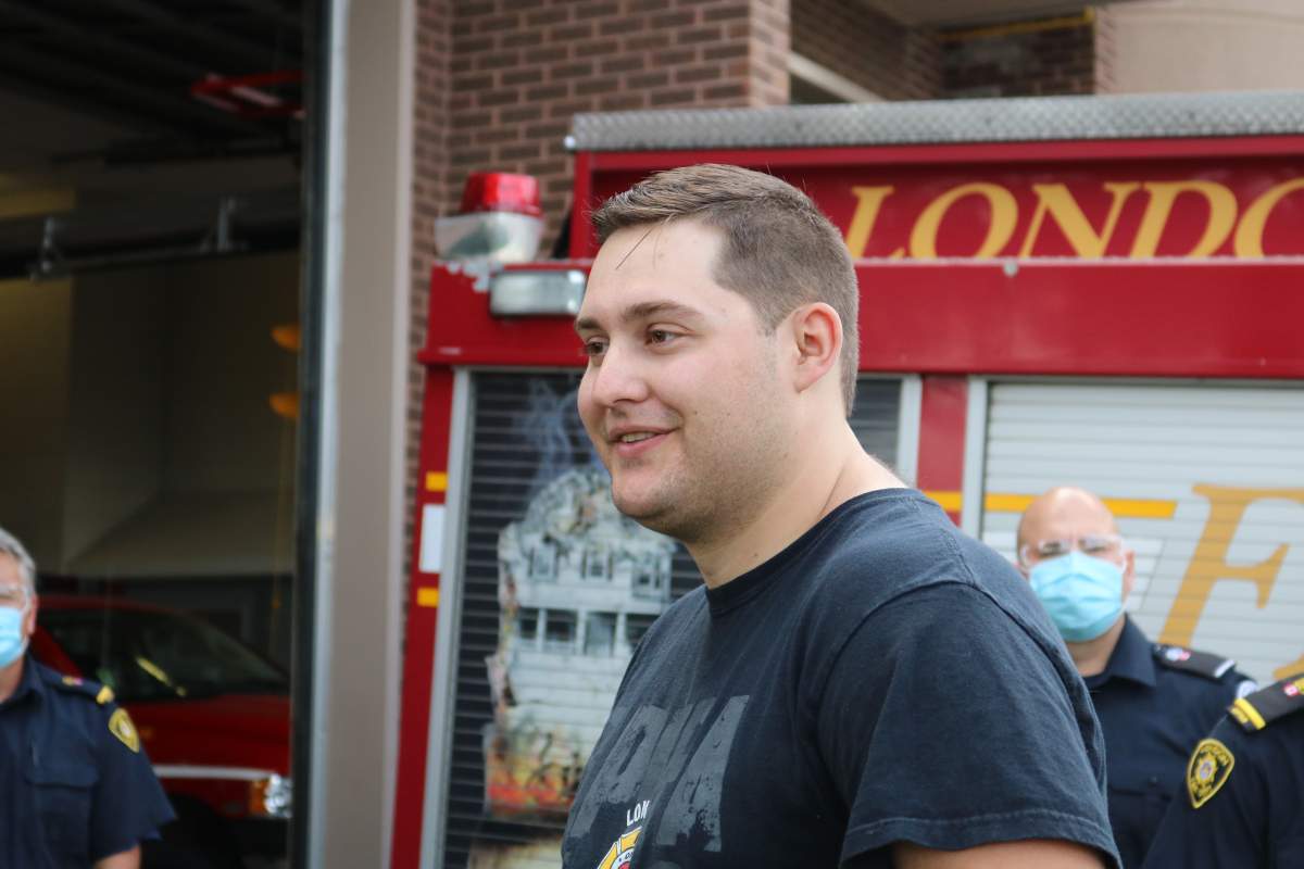Jacob Hurl at Station 3 meeting some of the firefighters who helped save his life during the Dec. 11, 2020 partial building collapse 555 Teeple Terr. in London, Ont., on Aug. 30, 2021