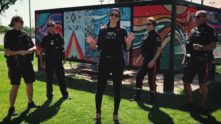 The lyrics, “it takes two to make a thing go right”, is a public service announcement asking all remaining residents to make sure they have a double dose of a COVID-19 vaccine.