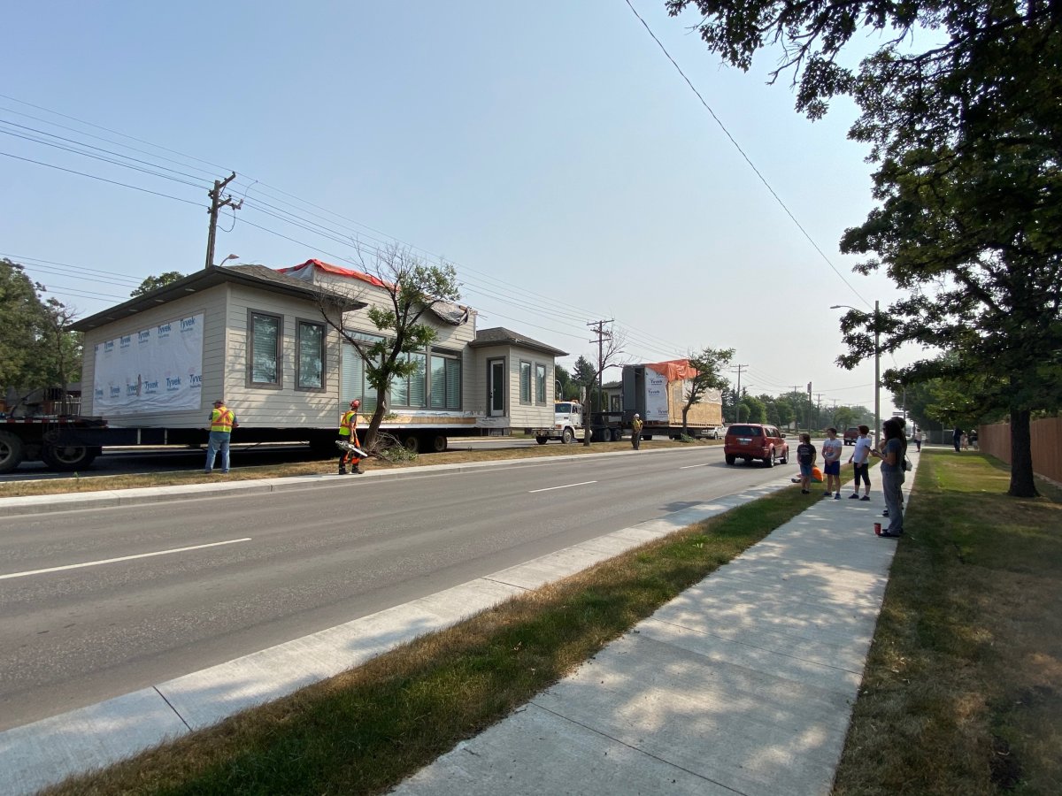 A building moving company is responsible for multiple trees being damaged on Roblin Blvd. Saturday.